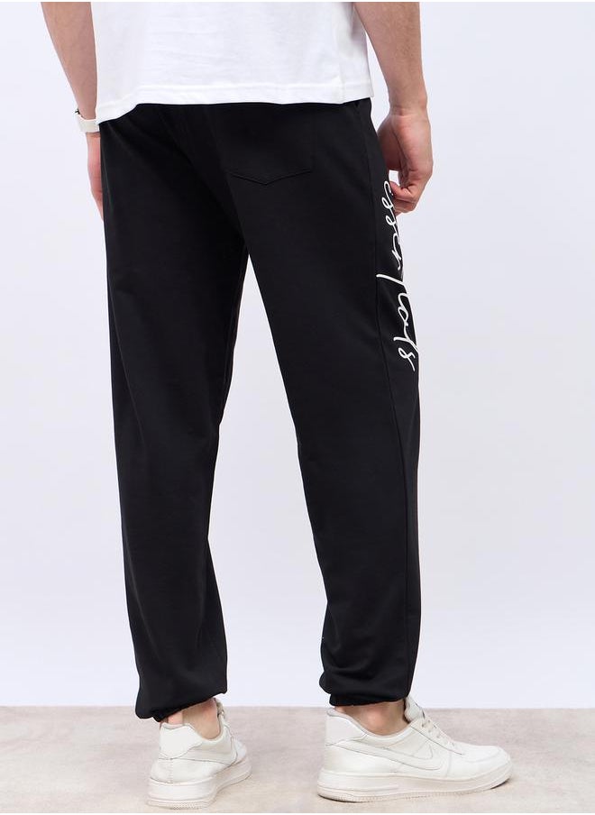 Styli - Slogan Print Oversized Jogger with Slip Pocket - Image 1
