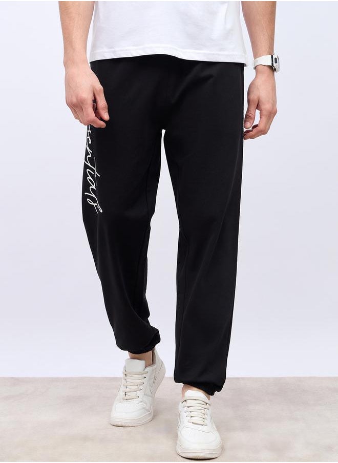 Styli - Slogan Print Oversized Jogger with Slip Pocket - Image 1