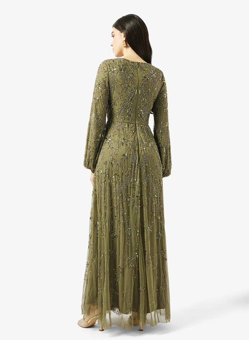 ماري فستان ماكسي مزين بالترتر بياقة قارب