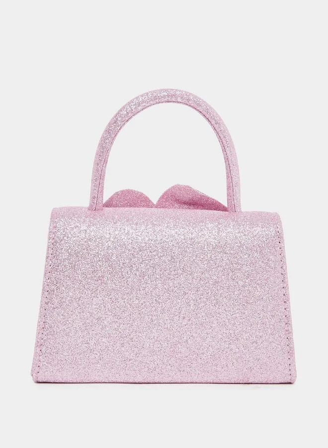 ستايلي شنطة ساتشل وردية مزينة بالزهور