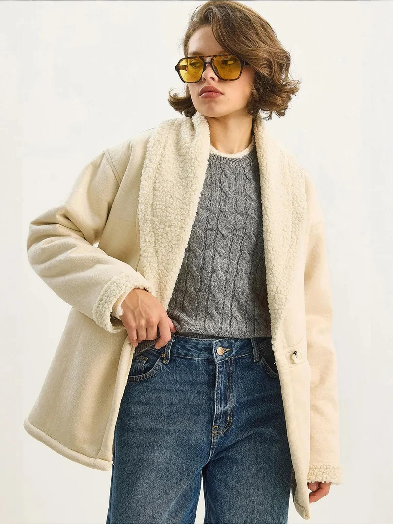 بيانكو لوتشي معطف بأزرار مزين بفرو صناعي من لوتشي