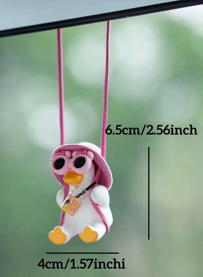 A pink duck-themed car rearview mirror pendant with a vacation vibe; a personalized and adorable car accessory. - Image 1