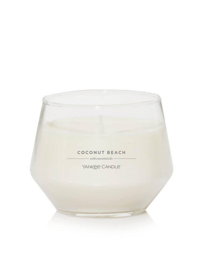 يانكي كاندل شمعة Yankee Candle Studio متوسطة الحجم، برائحة جوز الهند، 10 أونصة: شمعة طويلة الأمد برائحة الزيوت العطرية من مزيج شمع الصويا | مدة احتراق تتراوح بين 40 إلى 65 ساعة - Image 1