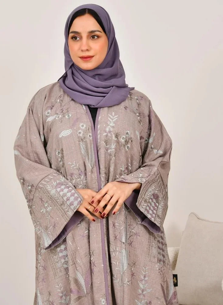 lamha abaya Half-cloche wrap abaya with wide sleeves and embroidery all over the abaya