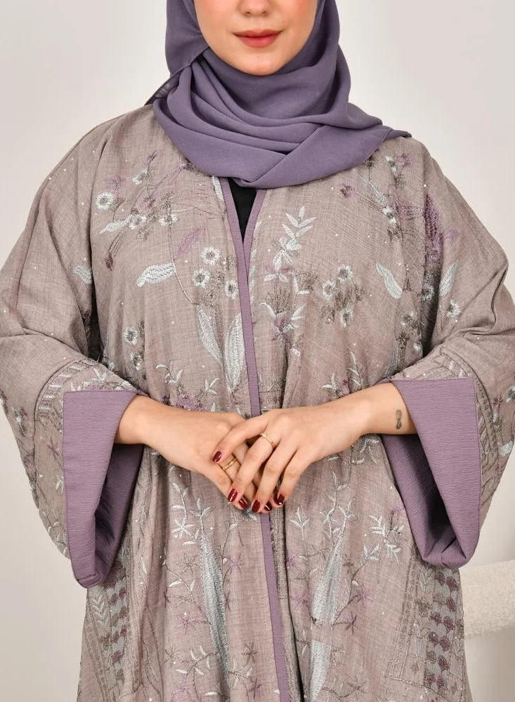 lamha abaya Half-cloche wrap abaya with wide sleeves and embroidery all over the abaya