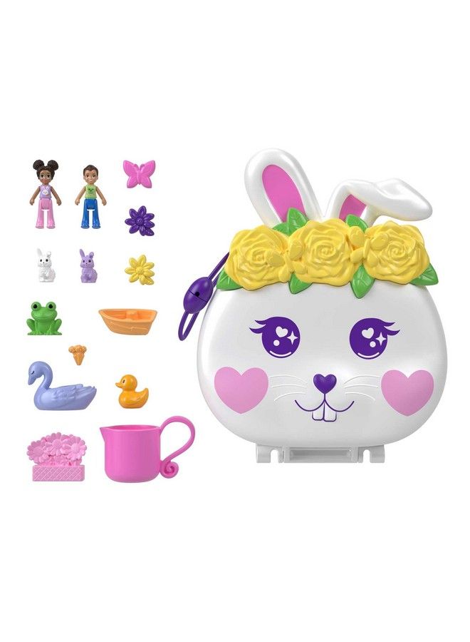 Polly Pocket مجموعة ألعاب مضغوطة لحديقة الزهور مع دميتين صغيرتين تغيير لون ولعب مائي - Image 2