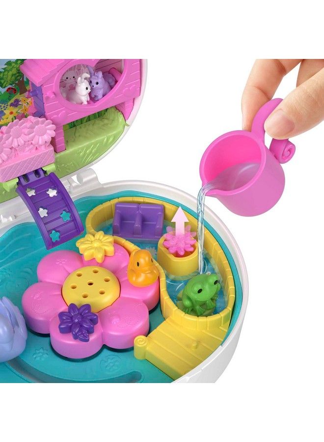 Polly Pocket مجموعة ألعاب مضغوطة لحديقة الزهور مع دميتين صغيرتين تغيير لون ولعب مائي - Image 5