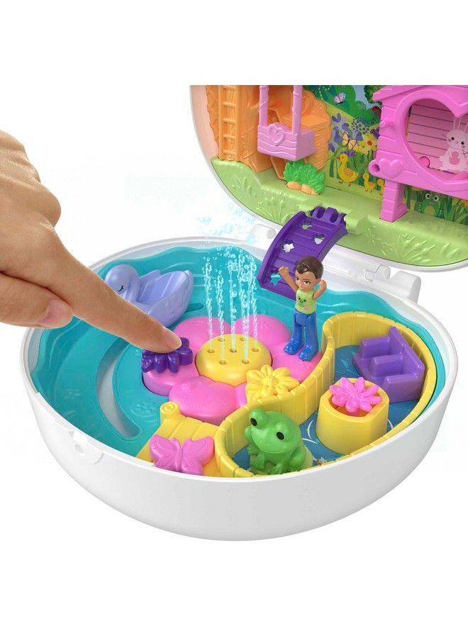 Polly Pocket مجموعة ألعاب مضغوطة لحديقة الزهور مع دميتين صغيرتين تغيير لون ولعب مائي - Image 4