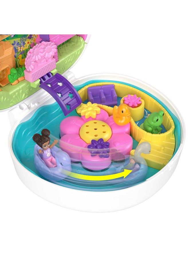 Polly Pocket مجموعة ألعاب مضغوطة لحديقة الزهور مع دميتين صغيرتين تغيير لون ولعب مائي - Image 3