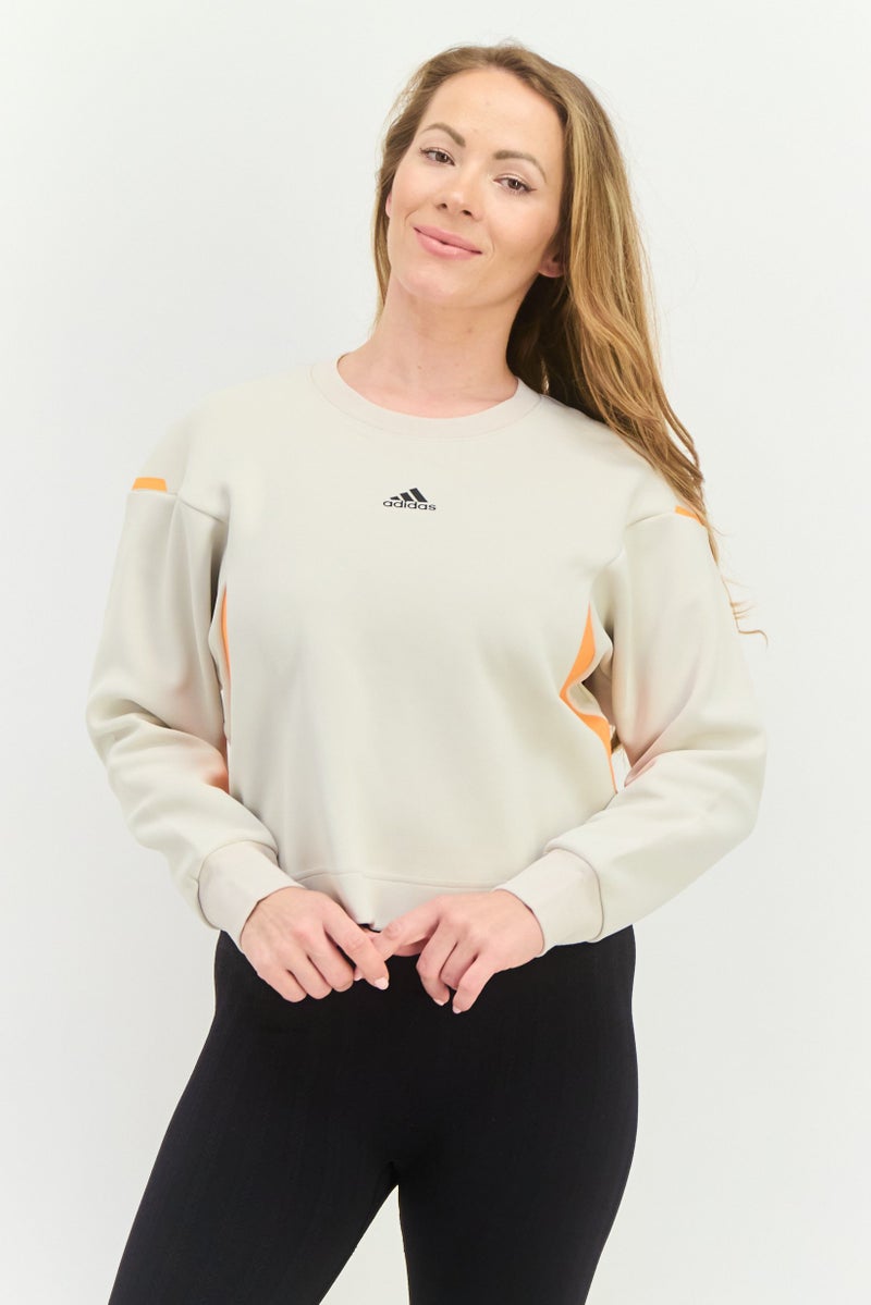 Adidas Women Sportswear Fit Long Sleeves Outdoor Sweatshirt, Beige/Orange  - Image 1