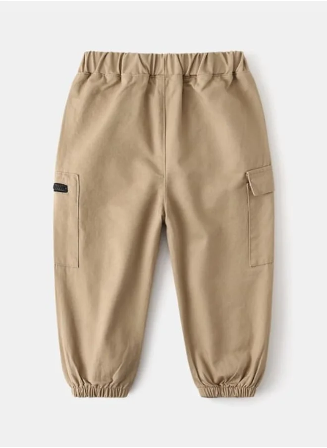 YUNIQEE Beige Regular Fit Mid Rise Solid Jogger Trouser
