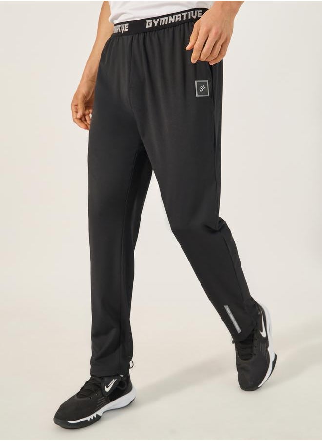 Styli Slim Fit Badge Detail Track Pants with Printed Waistband  - Image 1