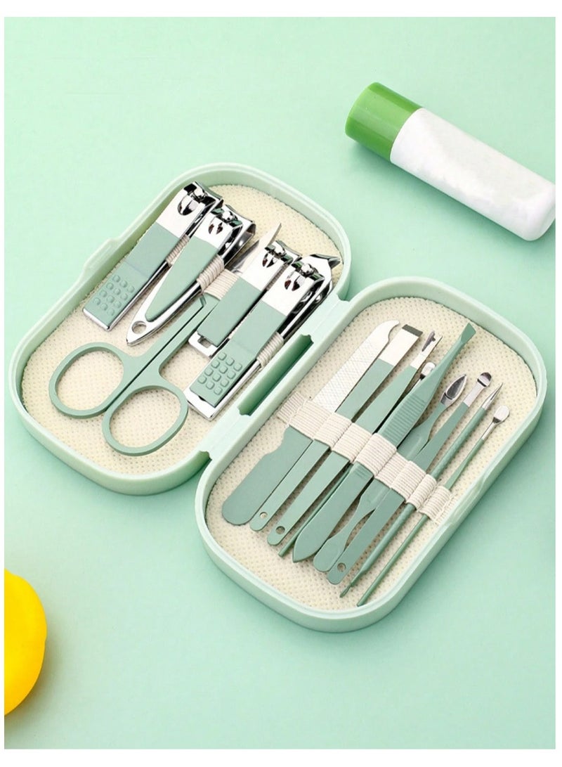 Generic 14-piece stainless steel manicure set in green in a small plastic box. All manicure tools, including nail clippers.  - Image 1