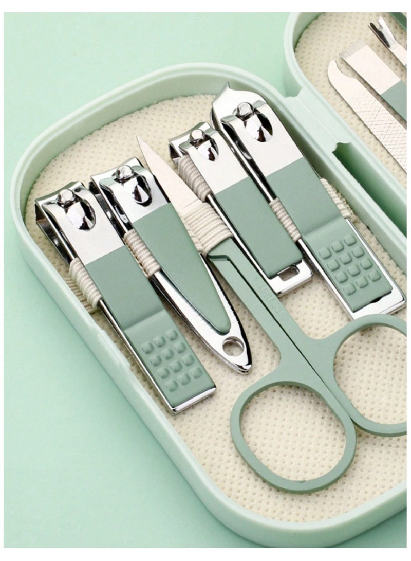 Generic 14-piece stainless steel manicure set in green in a small plastic box. All manicure tools, including nail clippers.  - Image 2