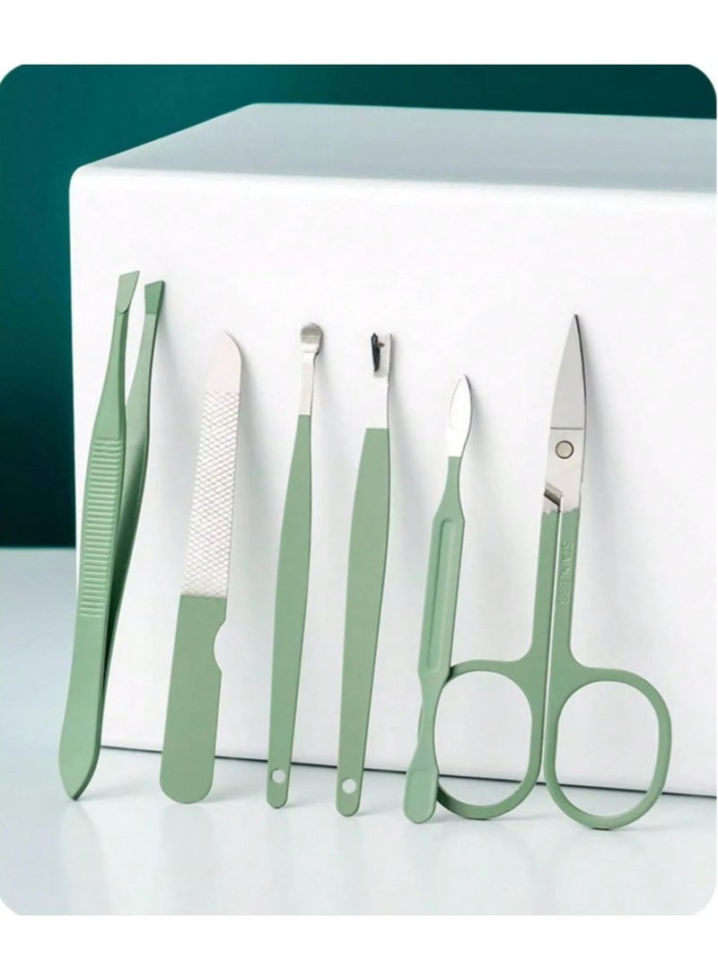 Generic 14-piece stainless steel manicure set in green in a small plastic box. All manicure tools, including nail clippers.  - Image 5