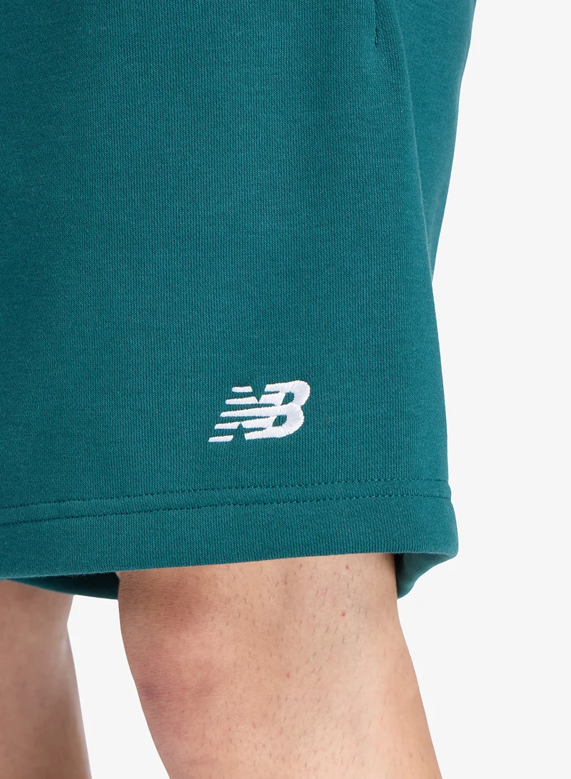 New Balance MEDUSA GREEN (AAV) 7" Essential French Terry Shorts for Men | Best Price UAE