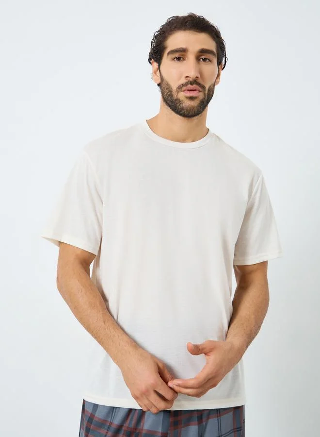 Styli Men Relaxed Fit Solid T-Shirt and Checked Pyjama Set