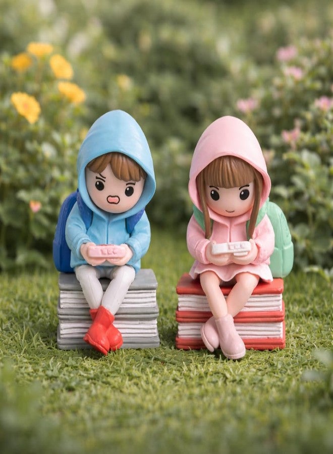 VAYINATO Mini Student Reading Figurines Set – Cute Hoodie Kids Sitting on Books Resin Decor (1 Pair, Random Color) Desk, Shelf, Garden Decoration Gift - Image 1