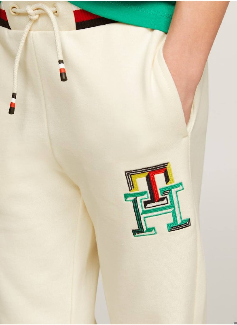 TOMMY HILFIGER - Boys' Th Monogram Embroidery Cuffed Joggers -  Pure cotton, Beige - Image 1