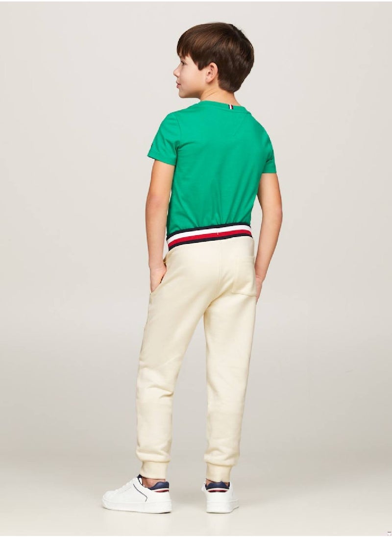 TOMMY HILFIGER - Boys' Th Monogram Embroidery Cuffed Joggers -  Pure cotton, Beige - Image 1
