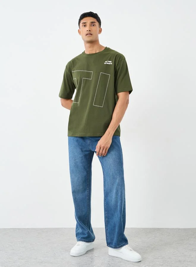 ستايلي تيشيرت أوفر سايز برسومات أمامية وخلفية بزيتون ستايلي