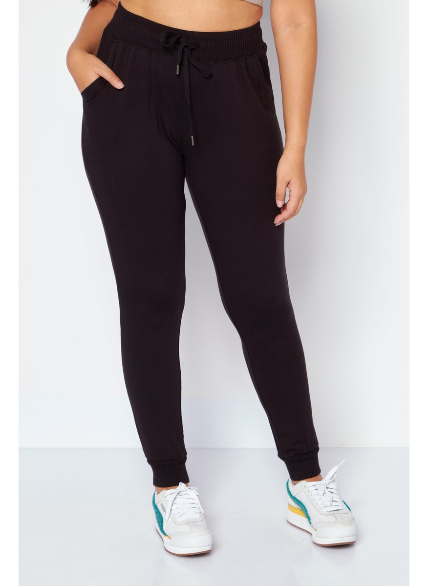 Women Regular Fit Plain Sweatpants, Black - pzsku/ZF5D00A31CB1296847312Z/45/_/1724351210/548ff3fb-0ca6-4884-ac08-dee047806aa9