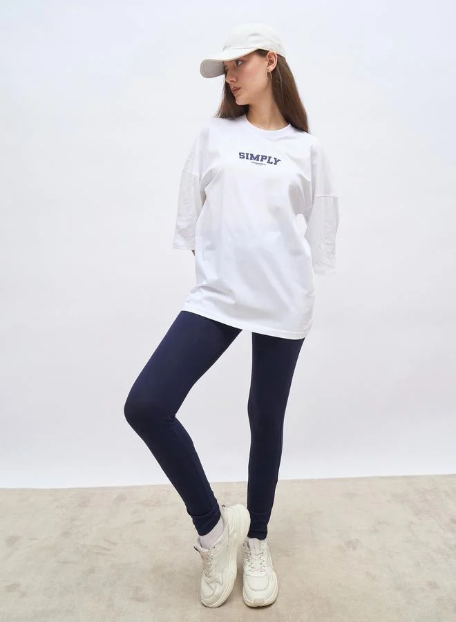 ستايلي Styli Oversized T-Shirt and Badge Print Leggings Set