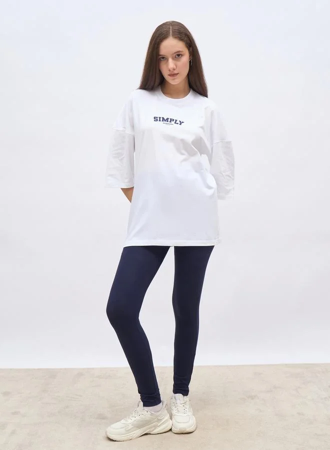 ستايلي Styli Oversized T-Shirt and Badge Print Leggings Set