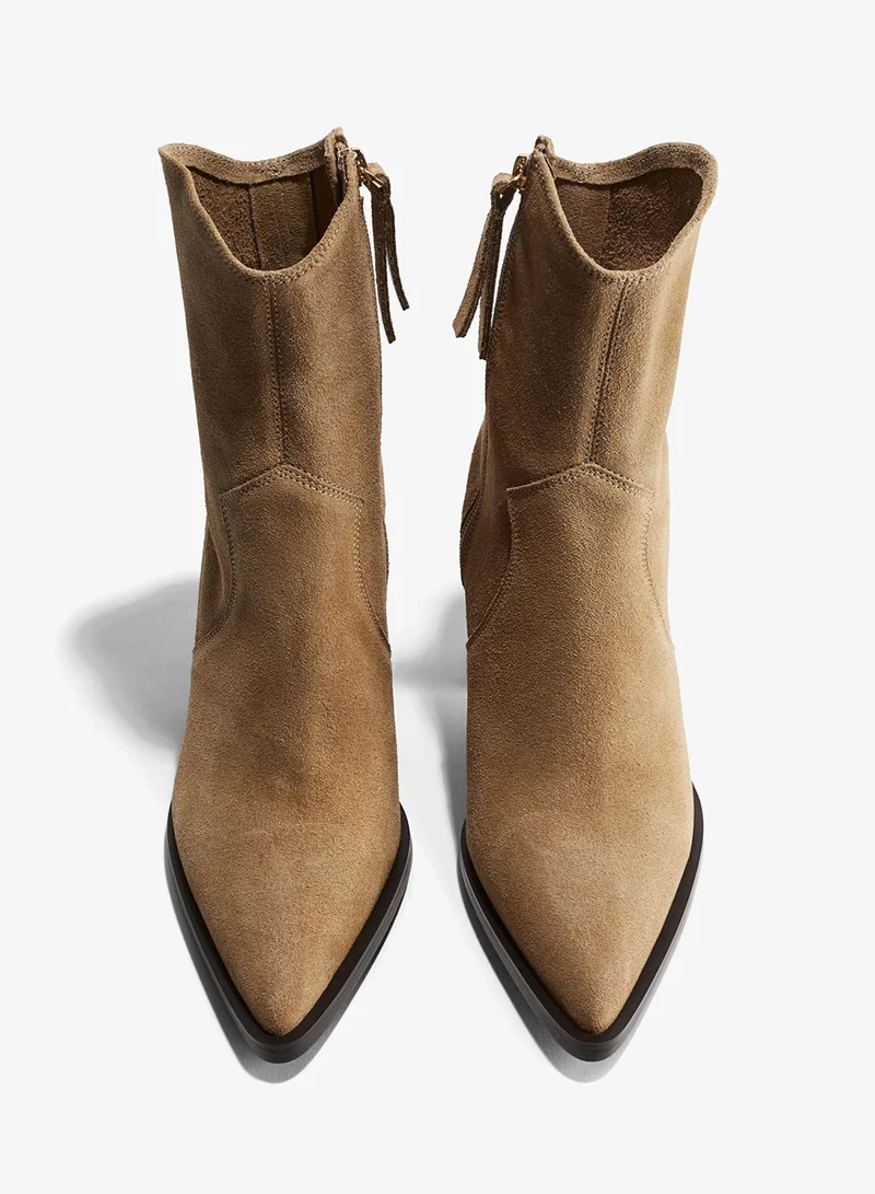 اتش اند ام بووت كاو بوي مصنوع من الجلد