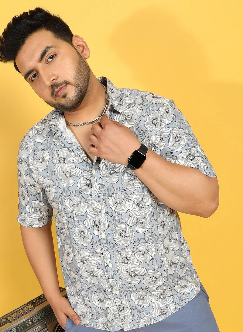 انستافاب بلس قميص رجالي أزرق جليدي بطبعة نباتية من إنستافاب بلس للملابس الكاجوال بياقة واسعة وأكمام قصيرة وإغلاق بأزرار من الرايون الثقيل بتصميم مريح للارتداء اليومي