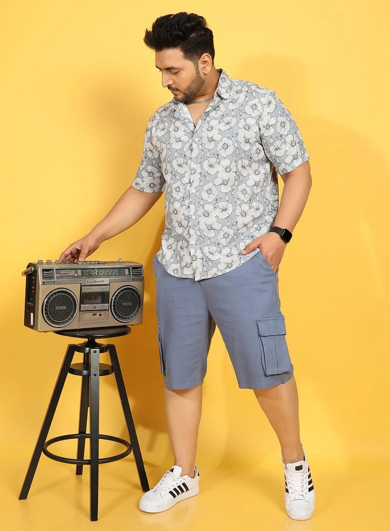 انستافاب بلس قميص رجالي أزرق جليدي بطبعة نباتية من إنستافاب بلس للملابس الكاجوال بياقة واسعة وأكمام قصيرة وإغلاق بأزرار من الرايون الثقيل بتصميم مريح للارتداء اليومي