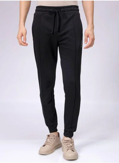 The Indian Garage Co Men Slim Fit Solid Mid-Rise Stretchable Knitted Jogger Trousers