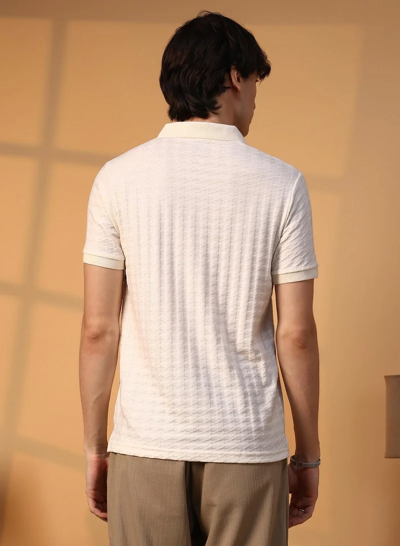 Campus Sutra Campus Sutra Men's Cream White Houndstooth-Textured Polo T-Shirt For Casual Wear | Polo Neck | Short Sleeve | Half-Button Closure | T-Shirt Crafted With Comfort Fit For Everyday Wear