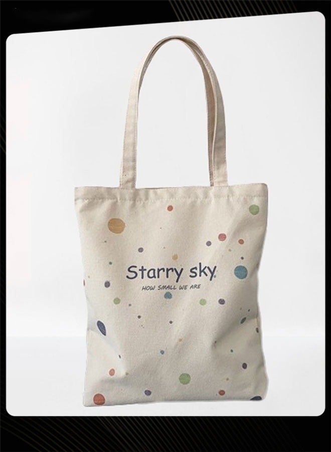 جوي شيك حقيبة قماشية جديدة قابلة للطي مطبوعة برسومات جرافيكية وحقيبة مدرسية كبيرة وخفيفة الوزن لحمل الأغراض اليومية للنساء باللون البيج - Image 3