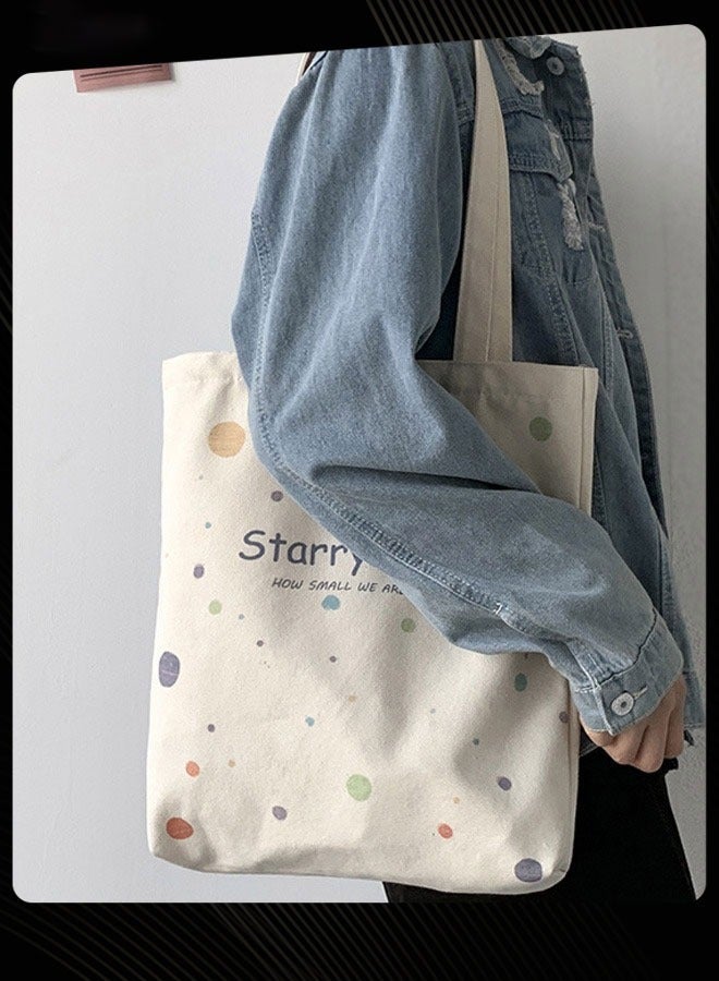 جوي شيك حقيبة قماشية جديدة قابلة للطي مطبوعة برسومات جرافيكية وحقيبة مدرسية كبيرة وخفيفة الوزن لحمل الأغراض اليومية للنساء باللون البيج - Image 1