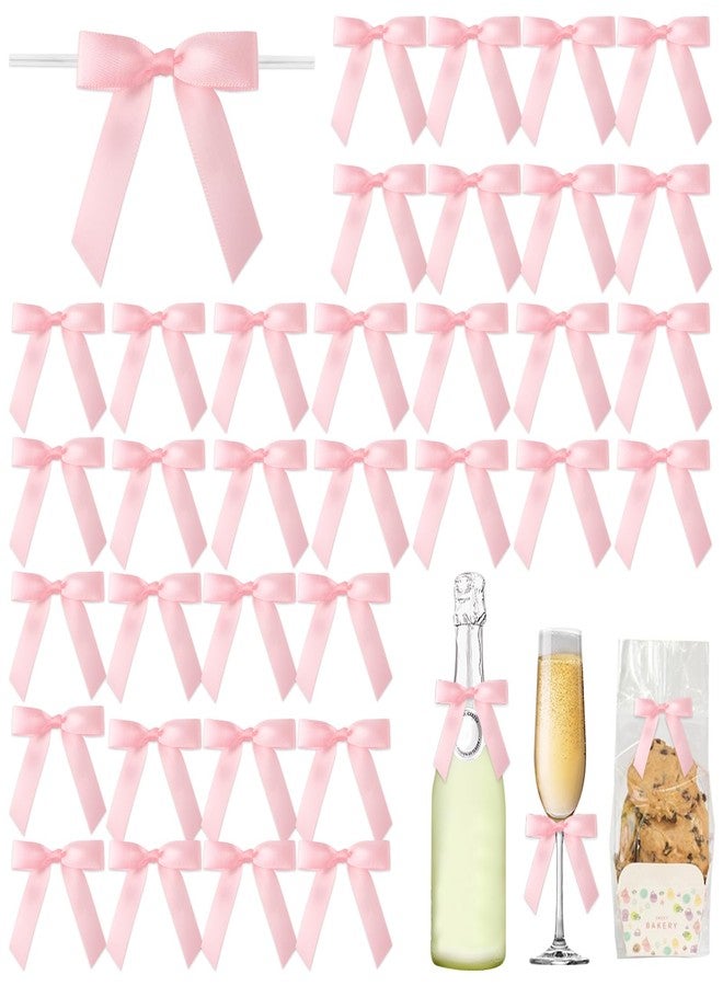 Blinket 50 Pcs Pink Satin Ribbon Twist Tie Bows 2.76×2.95 inch – Premade Small Bows for Gift Wrapping Treat Bags Wedding Baby Shower Party Favor Decorations - Image 1