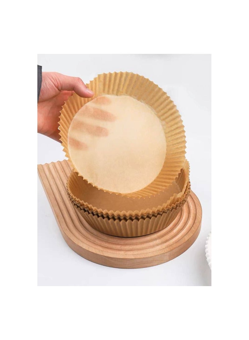 Air fryer paper is the same material as butter paper, but in the shape of a plate. You use it in the air fryer to protect it from grease and food residue. z - Image 1