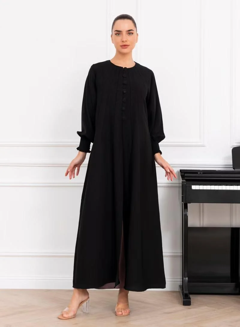 نيكياس عباية نيكاس سوداء كريب بطيات ومطاط في الأكمام