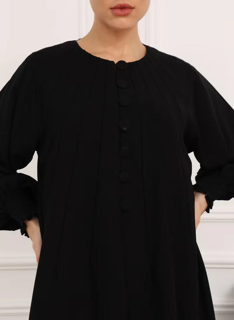 Nikias  Nikias Black Crepe Abaya With pleates and elastic In hands for Women | Best Price UAE