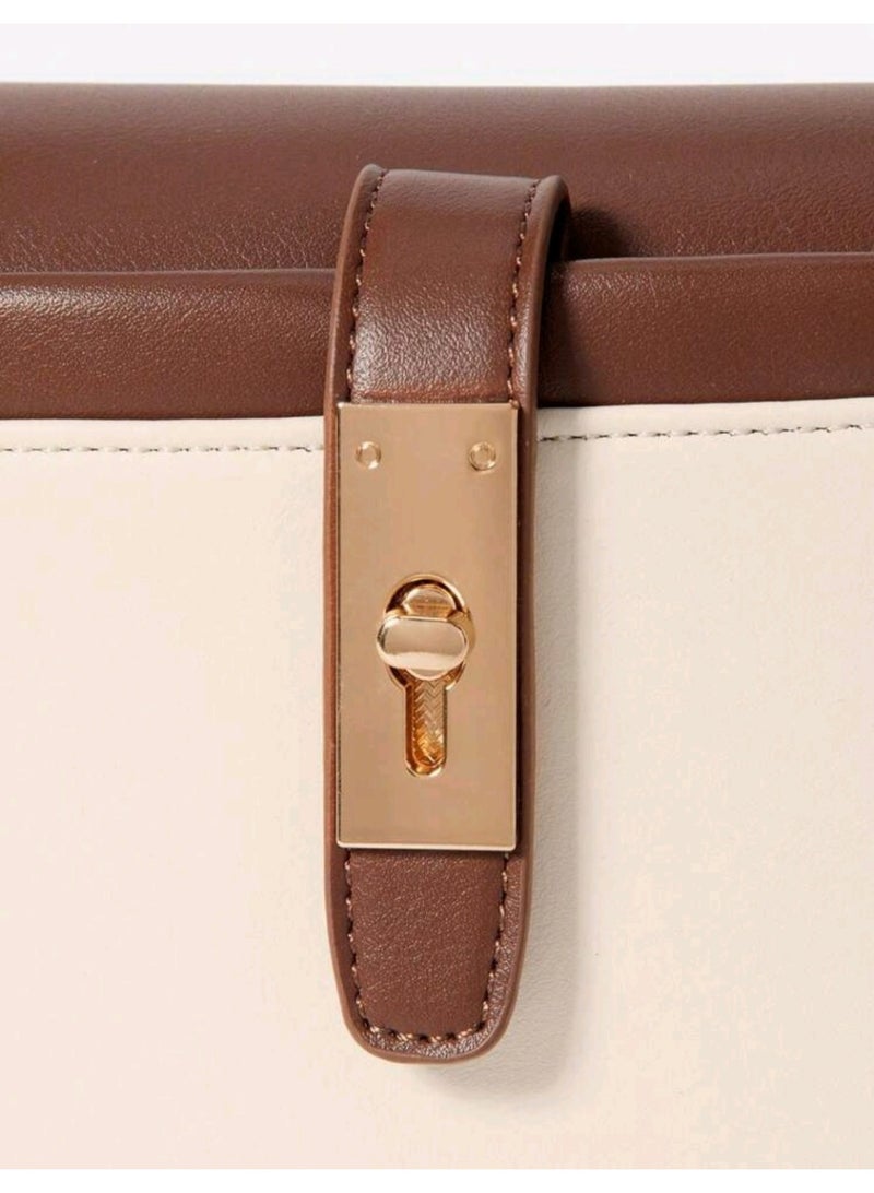 arab Women's handbag with a modern and elegant design. Features a chic beige and dark brown color combination with a gold-tone lock and adjustable shoulder strap. Perfect for daily use or special occasions, with a practical design that fits your essentials.  Dimensions: 10.5 cm (Height) × 17 cm (Width) × 13 cm (Depth)  Color: Beige and Brown  Gold-tone metal lock  Top handle and removable shoulder strap - Image 4
