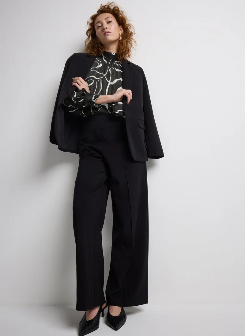 ماتلان بلوزة تونيك ساتان سوداء