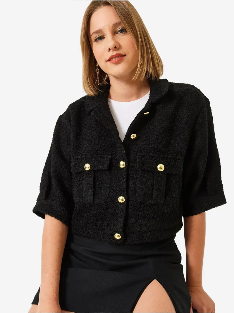 بيانكو لوتشي جاكيت قصير من القطيفة بأزرار وياقة قميص من لوتشي