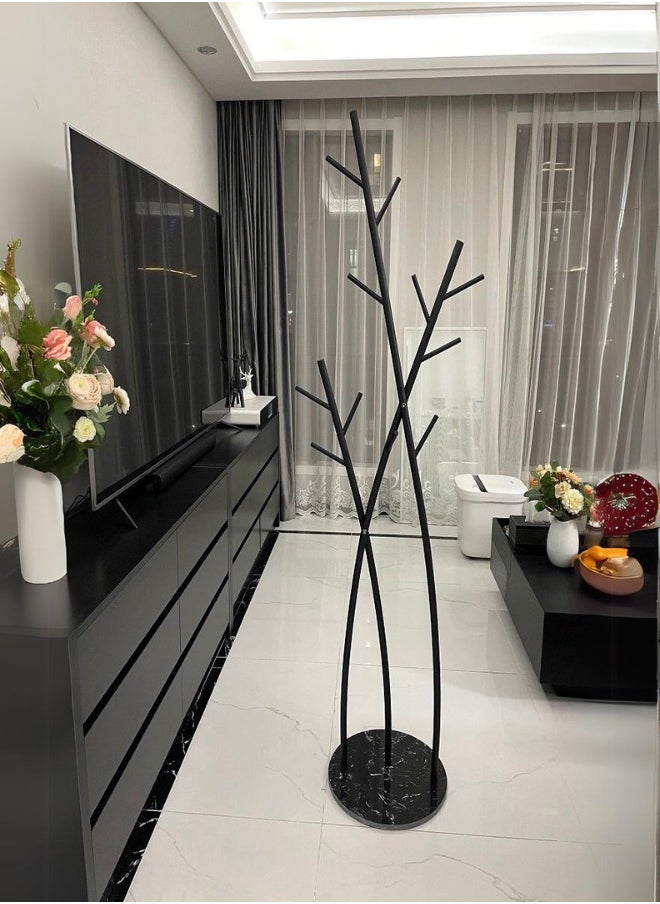 Stylish black metal floor clothes hanger with a modern tree-like design - pzsku/ZF624E45D780457CEDBF6Z/45/_/1724014801/23b192b2-8862-49e7-83c0-377ddca28172