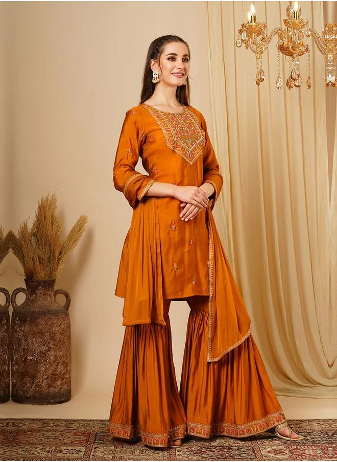 جلو باص Globus Women Mustard Round Neck Sequinned Embroidered Yoke Straight Kurta With Gharara and Lace Dupatta Festive Set by Styli