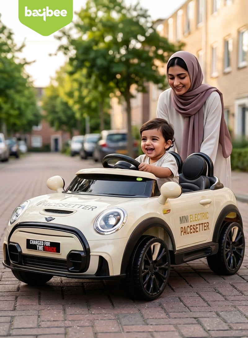 BAYBEE Cooper Childrens Electric Car for Kids, Baby Ride on Toy Childrens Battery OPerated Car with Led Light, Music, Remote Control & Swing Mode | Battery Car for Kids | Childrens Electric Ride on Car for Kids 2 to 6 Years Boy Girl Beige - Image 1