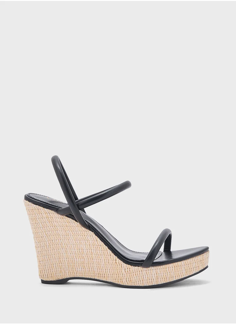 ايلا Ankle Strap Wedge Sandal