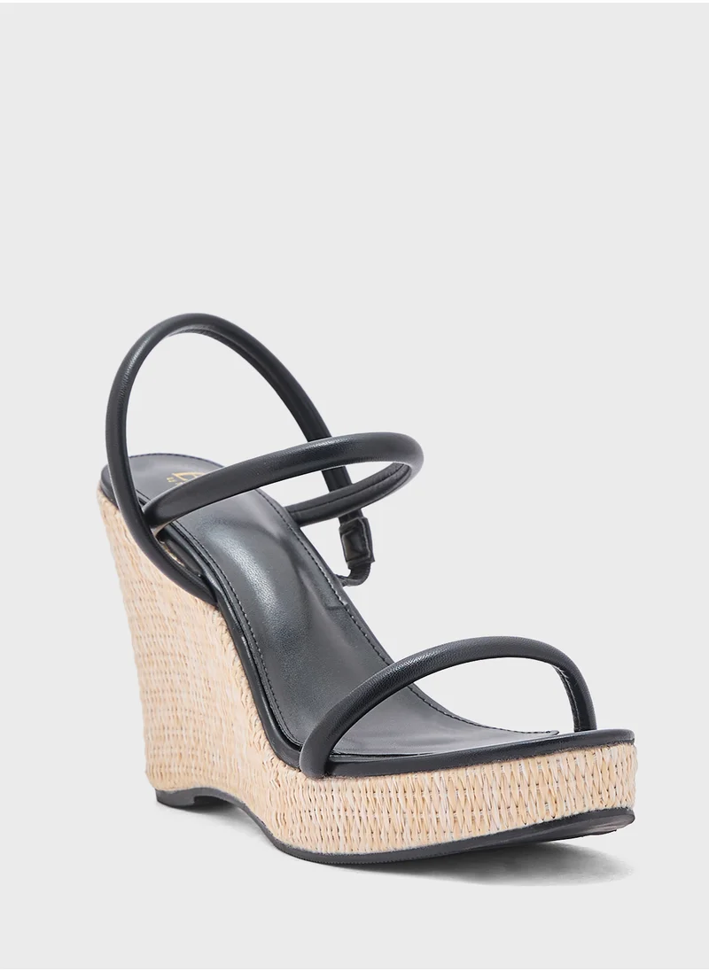 ايلا Ankle Strap Wedge Sandal