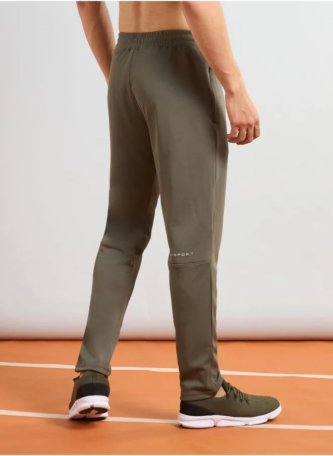 تكنوسبورت Technosport Men Green Solid 4-Way Stretch Track Pants