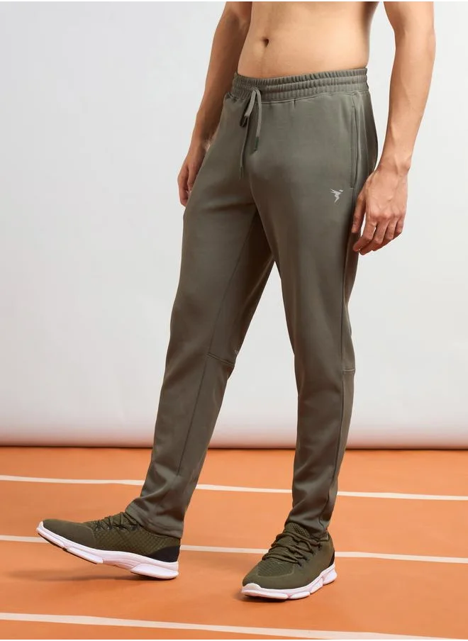 تكنوسبورت Technosport Men Green Solid 4-Way Stretch Track Pants