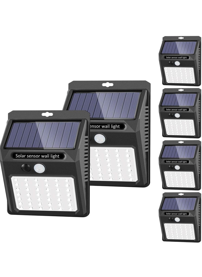 JAJEEK - Solar Powered Outdoor Lights [6 Pack] – Wireless Motion Sensor, 42 LEDs, IP65 Waterproof & Dustproof, 3 Adjustable Modes for Garden, Fence, Patio, Garage, Energy Efficient Security Lighting - Image 1